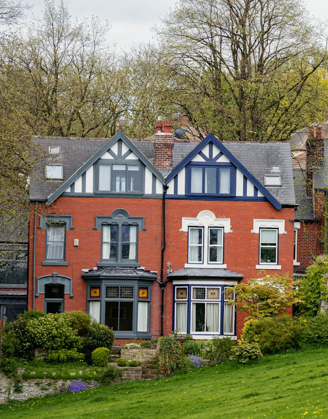 bay-front-semi Semi-detached Victorian townhouse with bay fronted windows sitting opposite a lush green open space